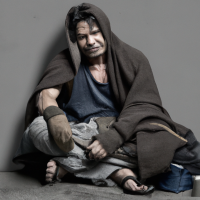 Realistic photo of dingdong dantes as homeless